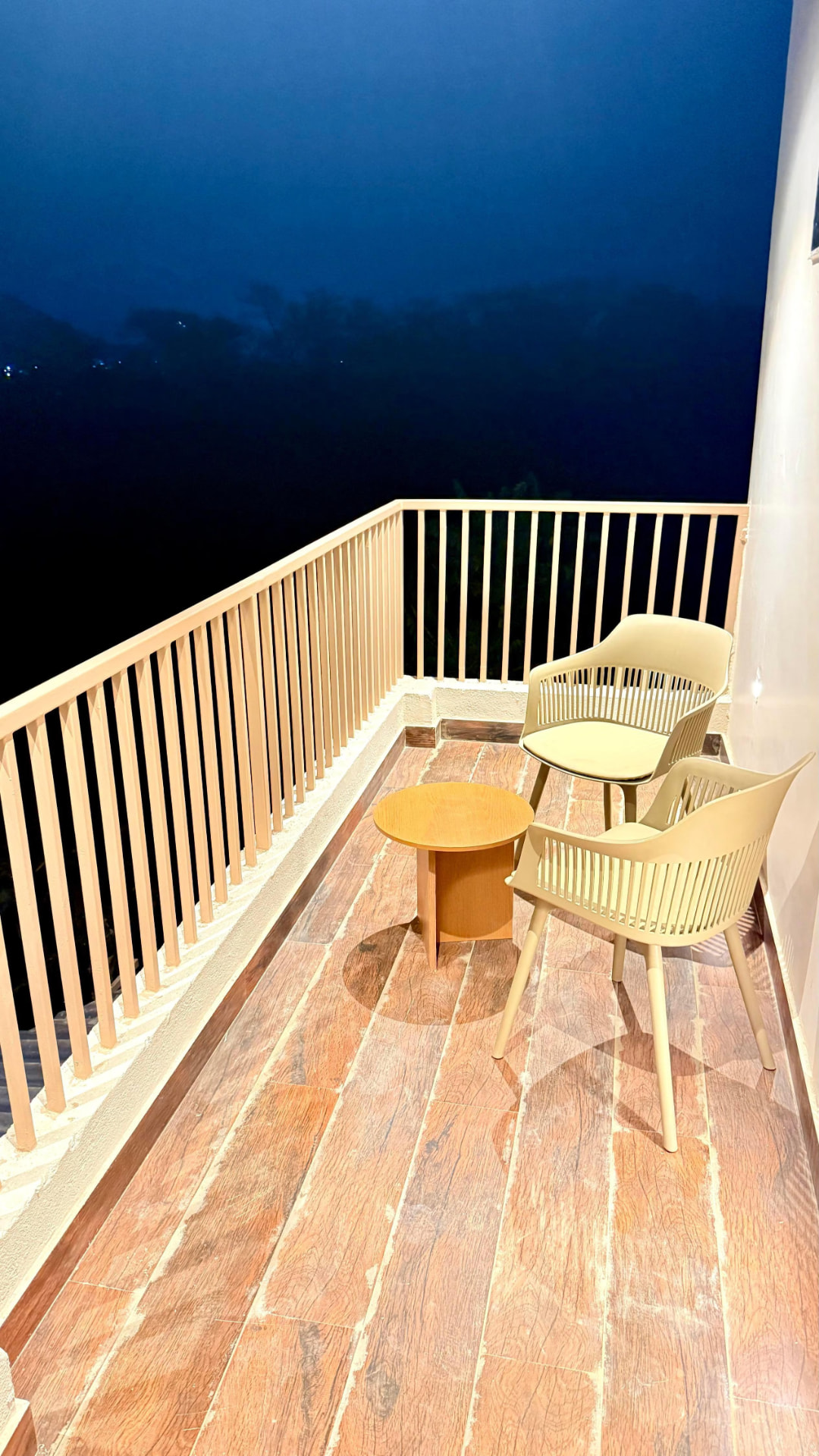 Private balcony overlooking the hills at night